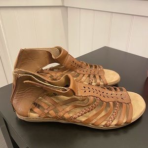 NEVER WORN brown leather gladiator sandals.